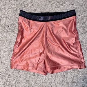 High waisted 3” Nike spandex shorts. Size M.